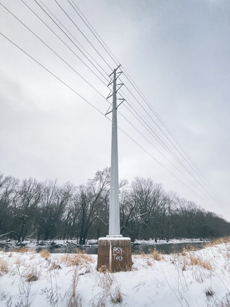 Photo of a large electric pole in winter